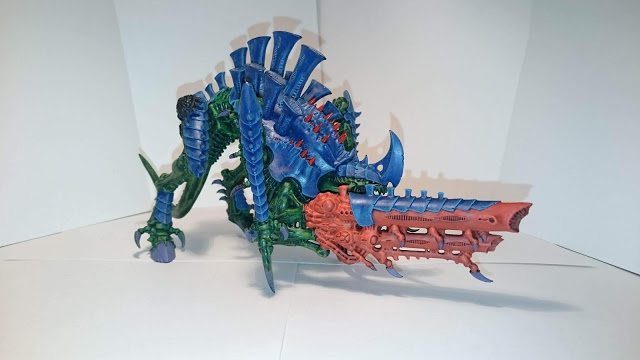 Tyrannofex - as they mature they grow red spikes...