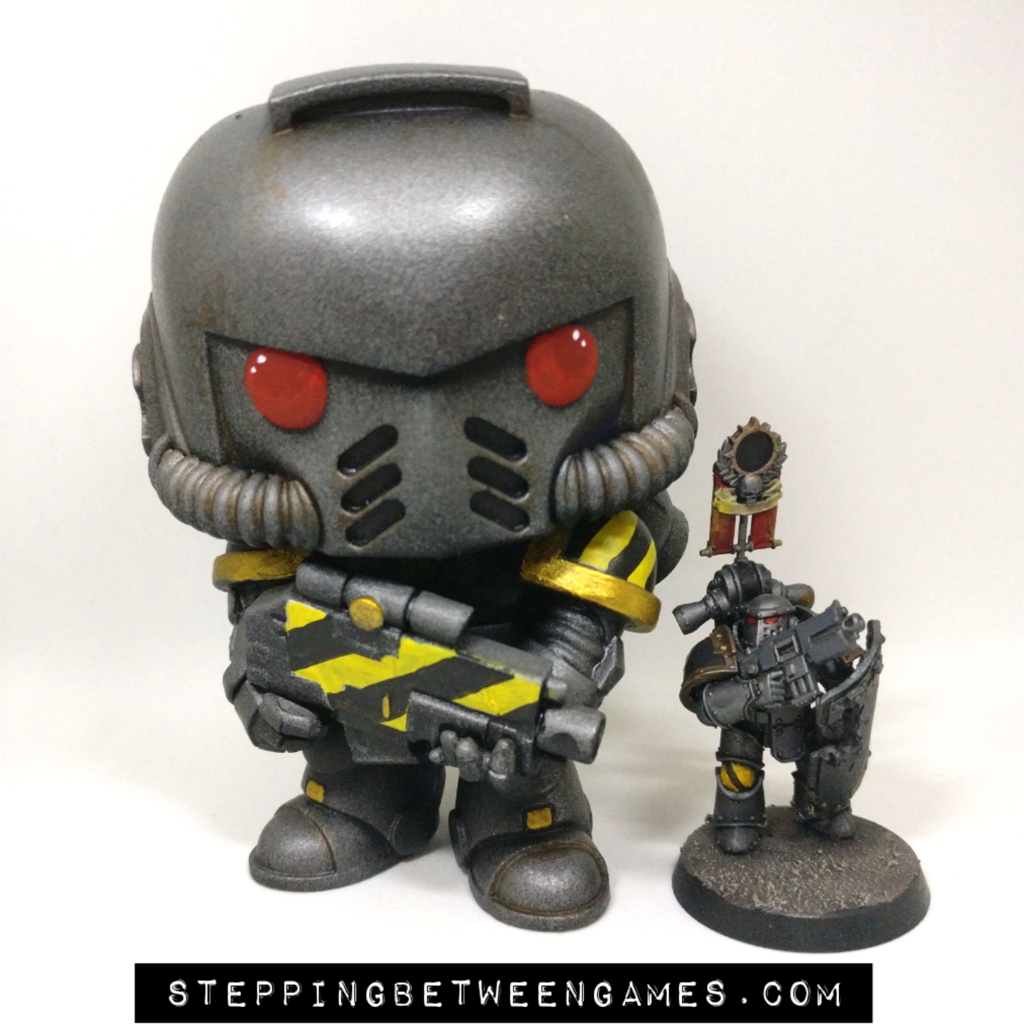 Iron Warriors Funko Pop size against 28mm marine